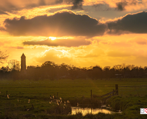 zonsondergang Nienoordschepolder kerk