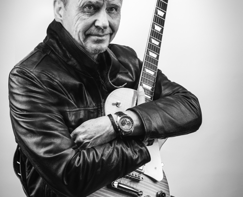 Portret Fred met gitaar