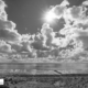 Laagwater Waddenzee met golfbreker en sunburst